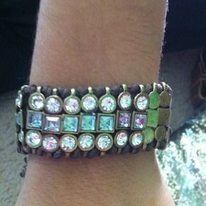 Gold and jeweled bracelet