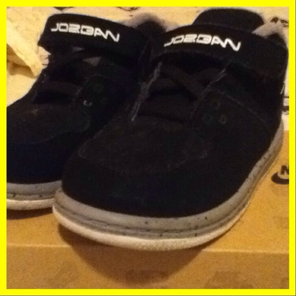 All black Air Jordan's with grey bottom Rims!