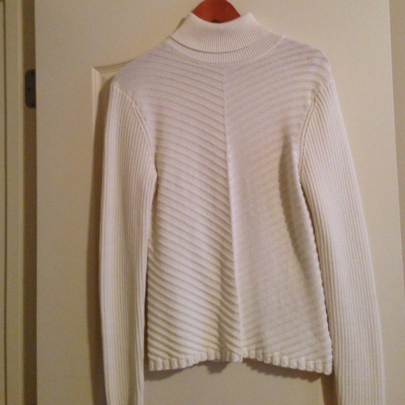 Cream sweater.
