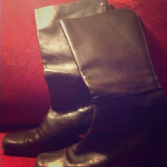 Dark brown leather boots.