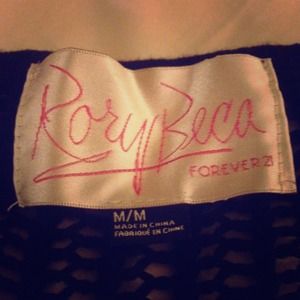 black lose knit sweater. large knit whole design