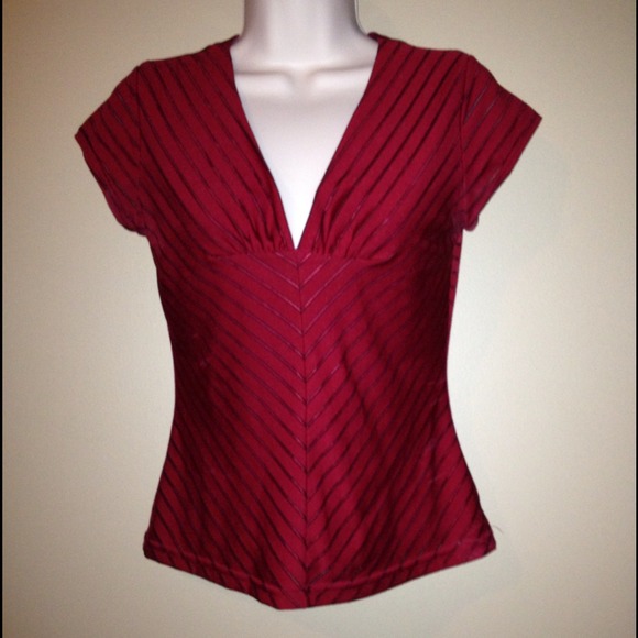 Satin red top with subtle stripes. Size medium.