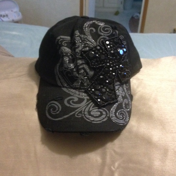 Black cross embellished hat