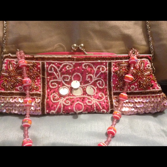 Sold. BUNDLED with multi color hobo purse