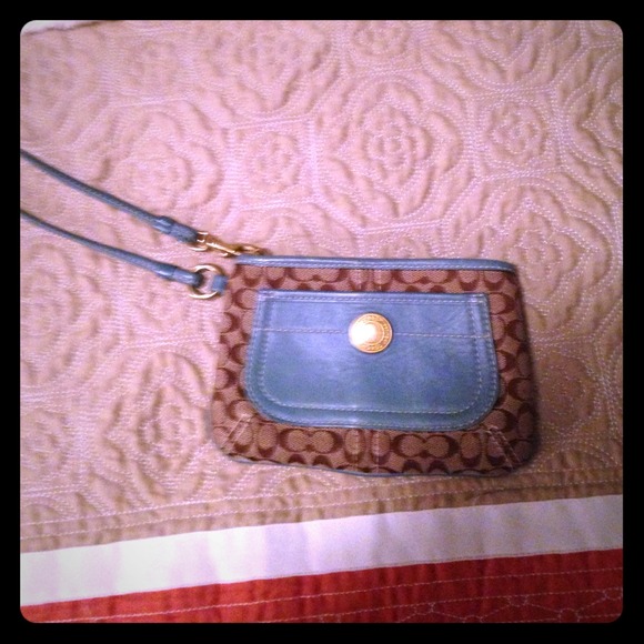 Blue and tan coach wristlet