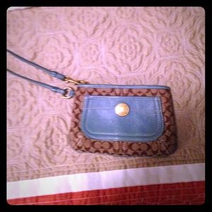 Blue and tan coach wristlet