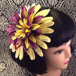 Large bright purple &yellow hair flair flower.