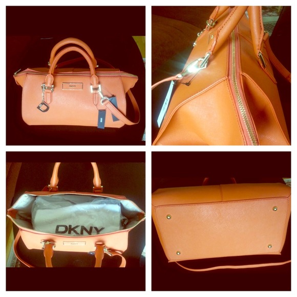 Beautiful brand new DKNY bag only worn once .