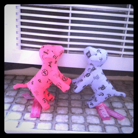 2 mini pink dogs.