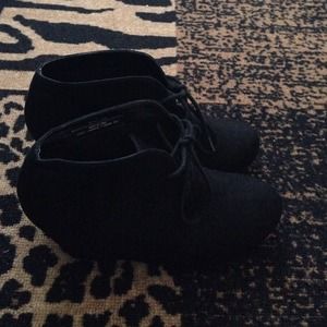 Black wedge booties.