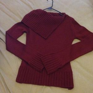 Dark red sweater with collar flap.