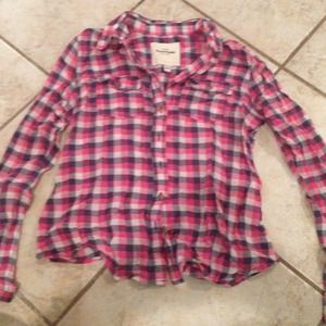 Long sleeve button up. Plaid shirt