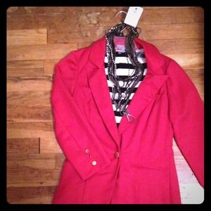 Red blazer with black and white striped lining