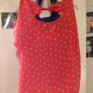 Mesh orange bow cut out back blouse.