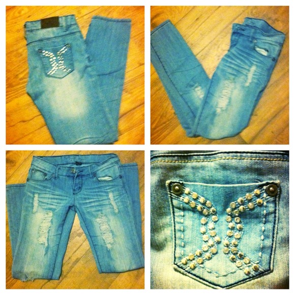 Distressed premiere denim jeans