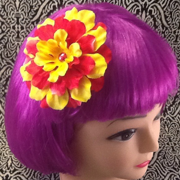 Fuschia &yellow hair flair flower.