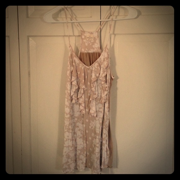 Tan and white ruffled front tank top