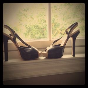 Black BEBE sling backs
