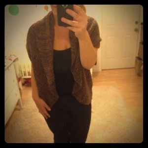 Long open sleeveless cardigan, chunky knit