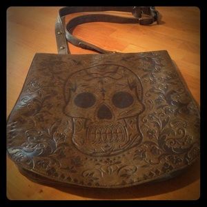 Loungefly skull messenger bag.