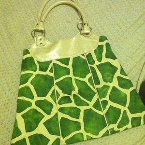 Medium size handbag carried twice.