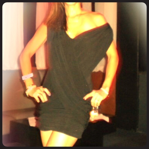 Slinky, sexy, drapey little black dress