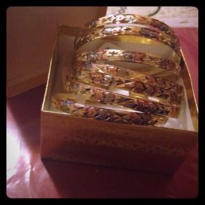 Bracelets all 7 of them !! Looks like real gold !!