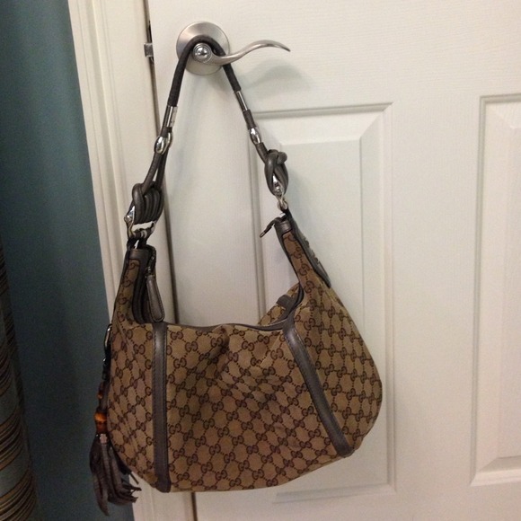 Gucci handbag, grey leather trim, wooden tassels.