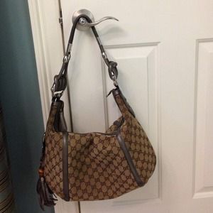 Gucci handbag, grey leather trim, wooden tassels.