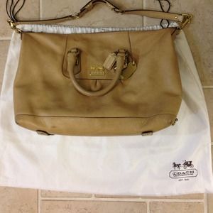 Coach handbag, lots of hardware! Three coach tags.