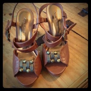 Brown sandals with mid size heel