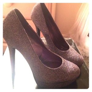 Carlos Santana glittery pumps