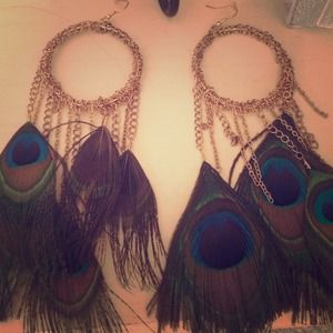 Hanging gold peacock earrings