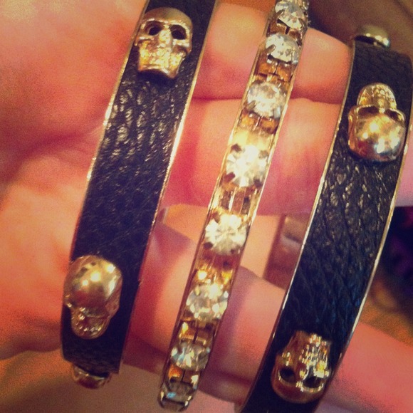 Leather and gold skull bracelets