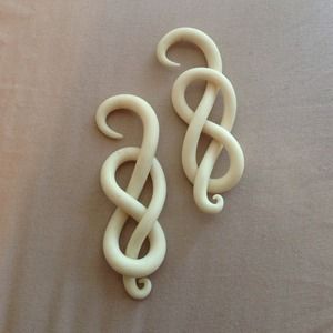 0g glow in the dark gauged earrings.