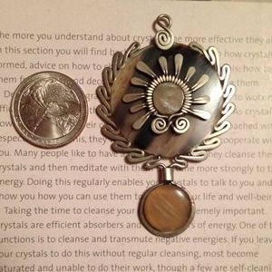 Two Peruvian pendents.