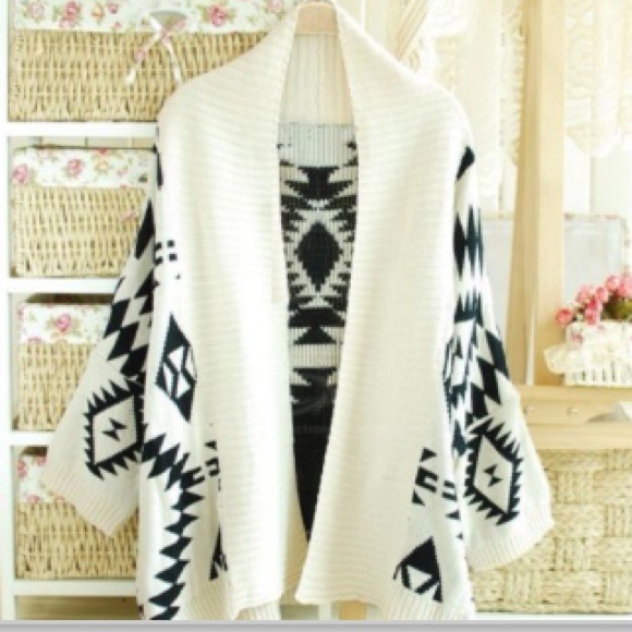 Beige and black aztec print cardigan.