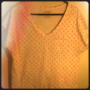White shirt with neon orange polka dots