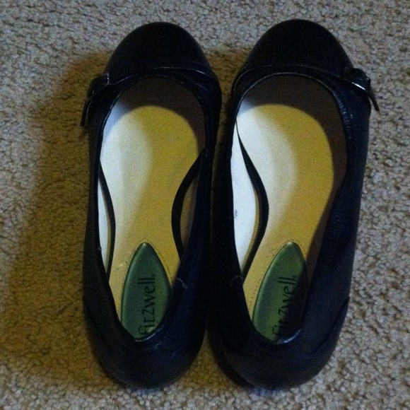 Black leather flats