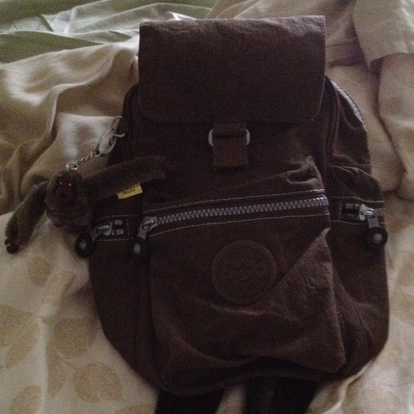 Brown Kipling backpack.