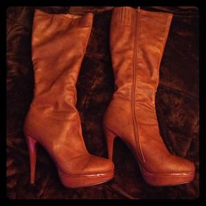 Knee high platform heeled boots