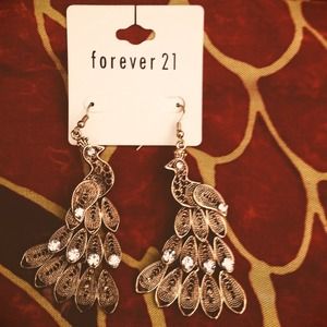 Gold peacock earrings