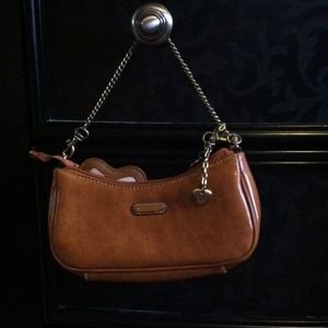 Brown leather clutch