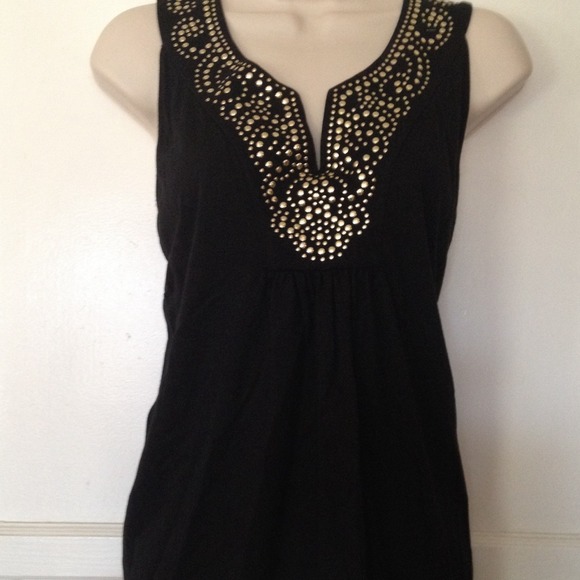 Sleeveless black gold studded shirt