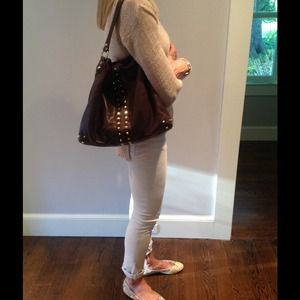 Stylish Michael Kors brown purse with gold studs
