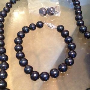 Cultured black peacock pearls