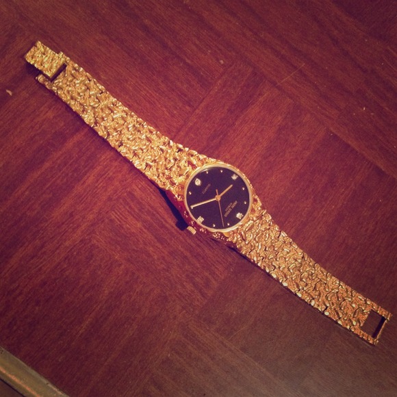 Andre Giroud gold an diamond watch
