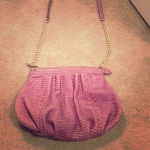 B. Makowsky magenta cross-body bag.