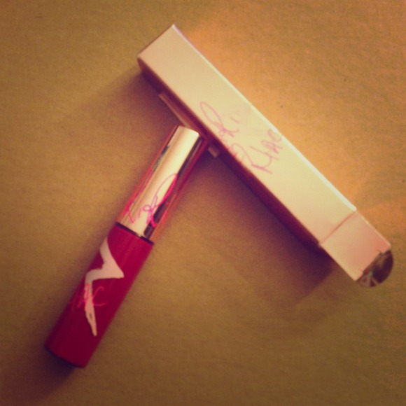 RiRi Hearts MAC lipglass in RiRi Woo