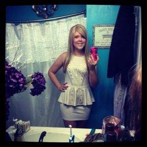 Amazing Dress same brand that makes BeBe dresses:)